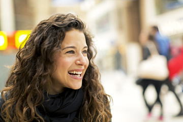 Portrait of a young attractive woman laughing - 62458321