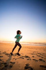 Afro woman running