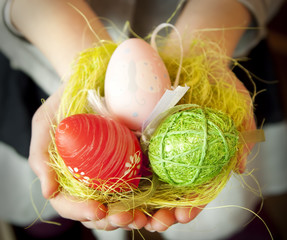 Hands Holding Easter Eggs