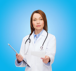 calm female doctor with clipboard