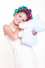 Obraz na płótnie Canvas little girl in curlers and pajamas sleep bedtime