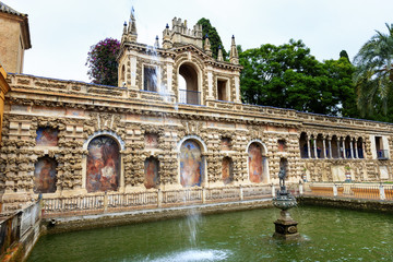 Fototapeta na wymiar Mercury Fountain Statue Mosaics Alcazar Royal Palace Seville