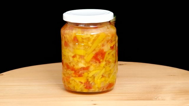 Glass jar with canned vegetables, letcho
