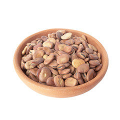 Broad beans in bowl of clay isolated over white