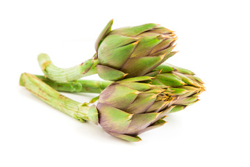 Fresh artichokes isolated on white background