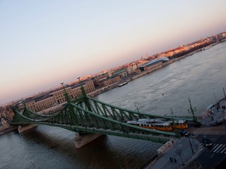 city landscape with river and bridge