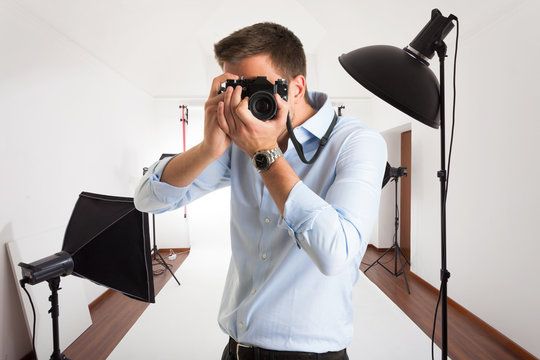 Photographer in his studio