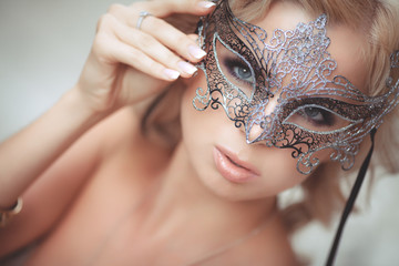 Vogue sexy woman in Venetian mask