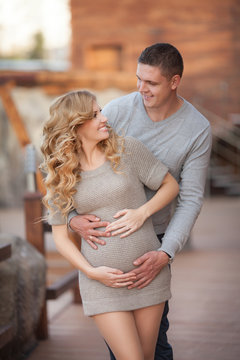 Pregnant woman and husband happy family pregnancy