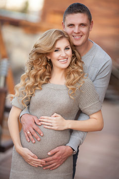 Happy Pregnant woman and husband family pregnancy