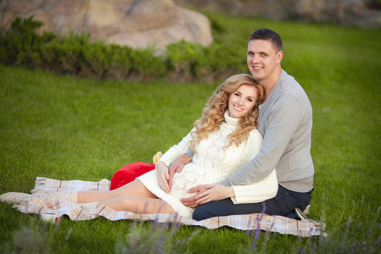 Pregnant woman and husband happy family pregnancy