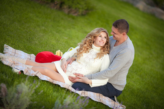 Pregnant woman and husband happy family pregnancy