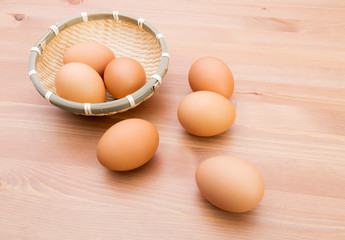 Brown egg in basket