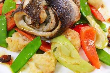 Sea bass fillet with spring vegetables