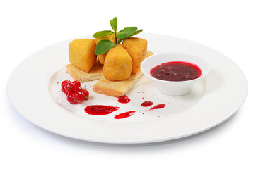 Cheese in breadcrumbs with currant jam