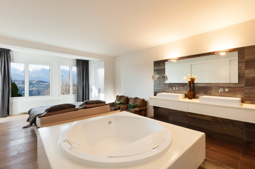 beautiful interiors of a modern house, bedroom