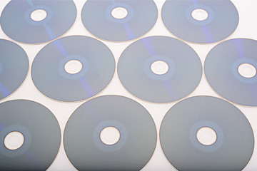 a group of blue-ray disk on white background