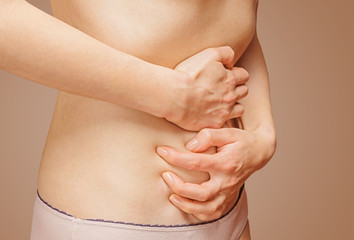 Pain in the female stomach
