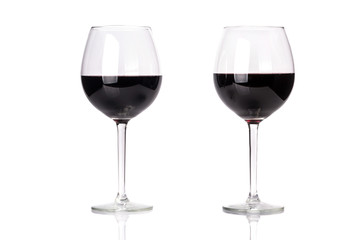 Glasses of red wine isolated on white background