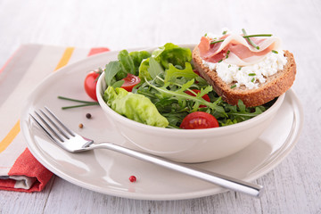 vegetable salad and bread with cheese