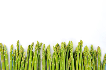 Fresh green asparagus on white ป