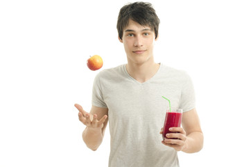 Man preparing red smoothie from bio apples, eating healthy, diet