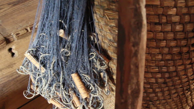 A blue fishing net on a basket