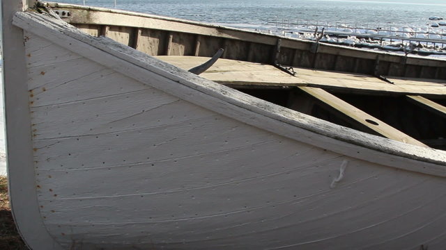 An abandoned boat near the shore
