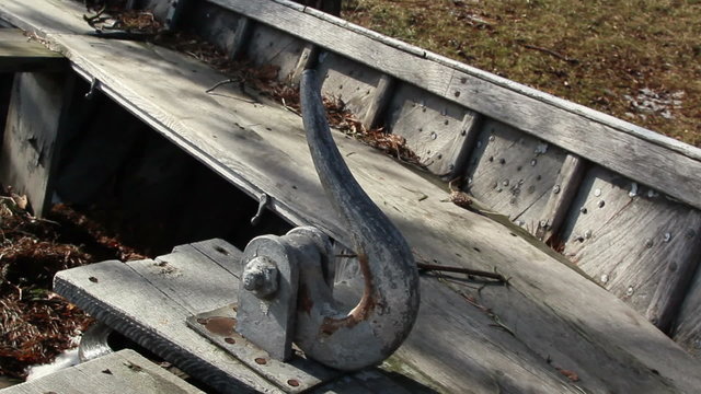 A small anchor inside the boat