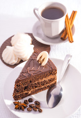 delicious chocolate cake and cup of coffee