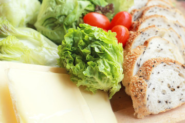 bread sprinkled with sesame -  vegetable green salad