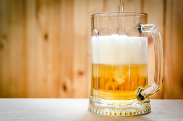 Beer pouring into mug