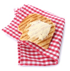 Grilled bread with butter, isolated on white