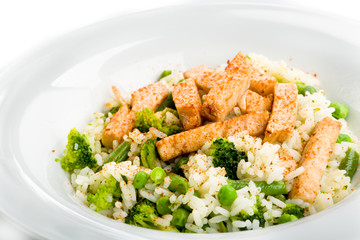 rice dish with fresh vegetables and chicken