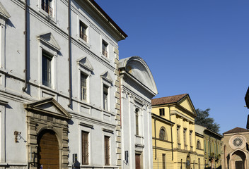 neoclassic buildings in old street, Lodi, Italy