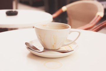 Dirty coffee cup and saucer