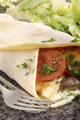 crepe with bacon and scrambled eggs