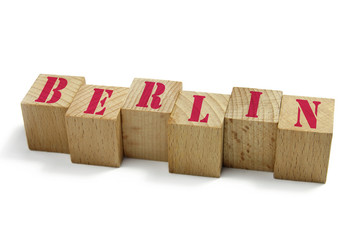 Berlin word on wood cubes isolated on white background