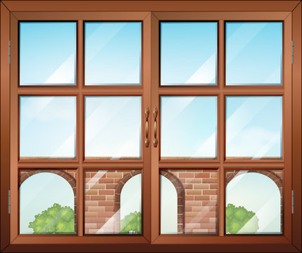 A closed window with a view of the gate