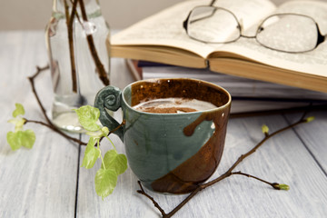 Coffee with cream in the original cup