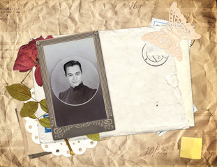 Old envelope, photo and dry rose flower