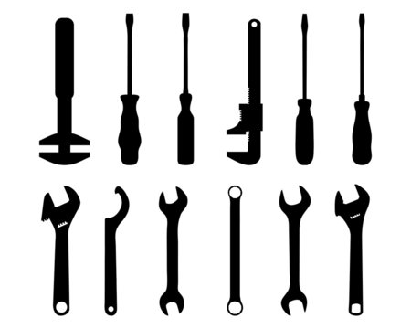 Black silhouettes of screwdriver and screw wrench, vector