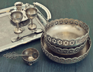 old silver utensils on a tray - 62516314
