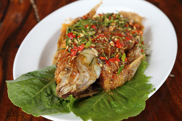 Fried ruby fish topped with sweet,sauer and hot sauce