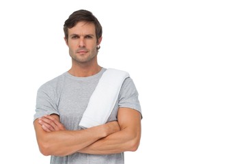 Portrait of a fit young man with towel