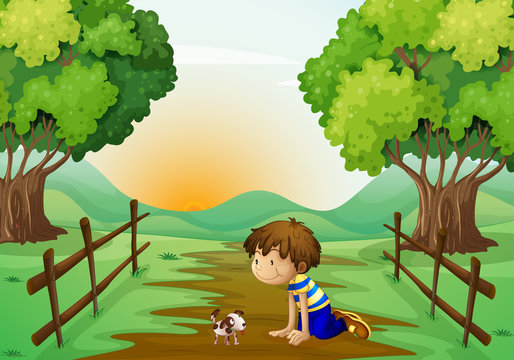 A young boy and his pet in the middle of the street