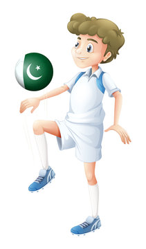A player using the ball with the Pakistan flag