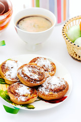 Buns with cinnamon and coffee