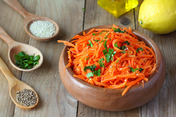 Korean-style spicy carrot salad with coriander and sesame seeds