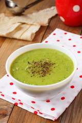 Vegan green pea soup with coconut milk with spices